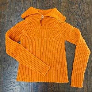 Orange MaxMara keyhole sweater.